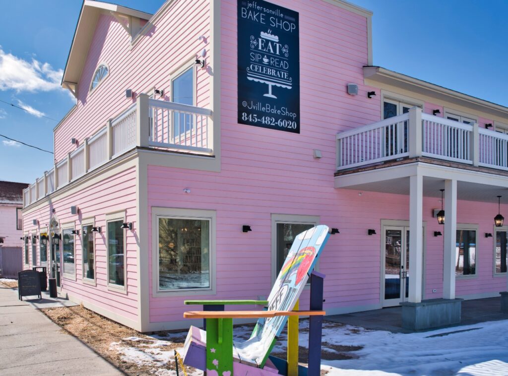 An exterior view of the Jeffersonville Bake Shop painted in light pink in Sullivan County, NY.