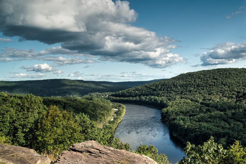 A river cuts through the Catskills landscape. 