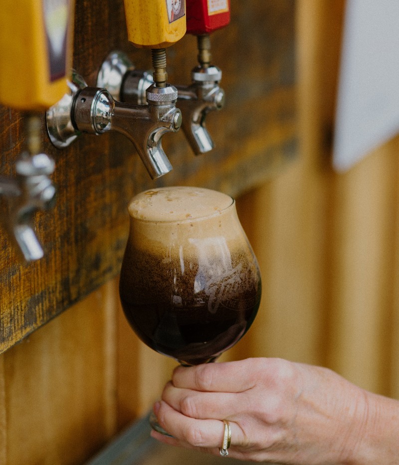 A poured brown ale from a tap at the Roscoe Beer Co. 