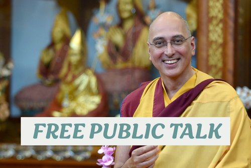 A smiling monk in traditional robes promotes a public talk, with colorful statues in the background enhancing the spiritual atmosphere.