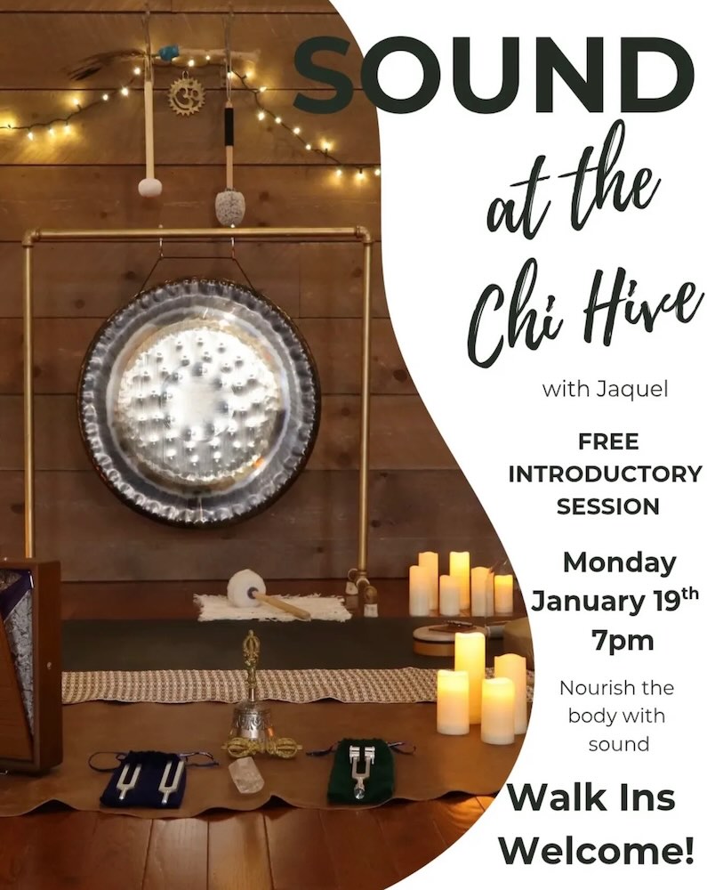 A calming space with a large gong, candles, and decor, promoting a sound healing session at the Chi Hive.