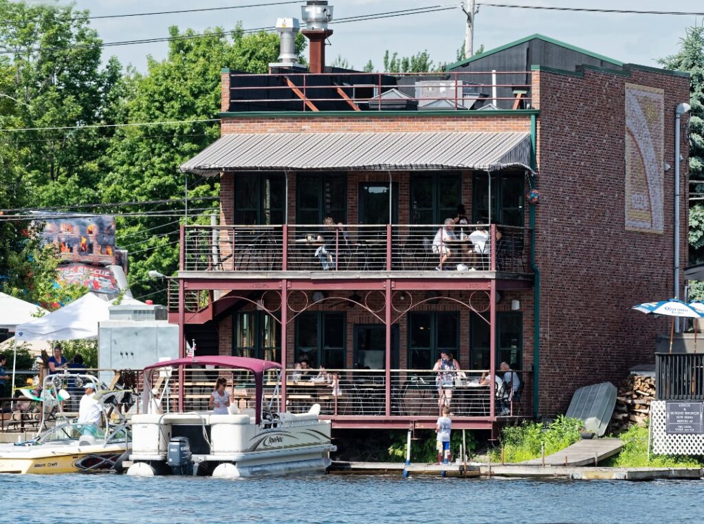 The back upper and lower decks on the river of Benji & Jake's in Sullivan County, NY.